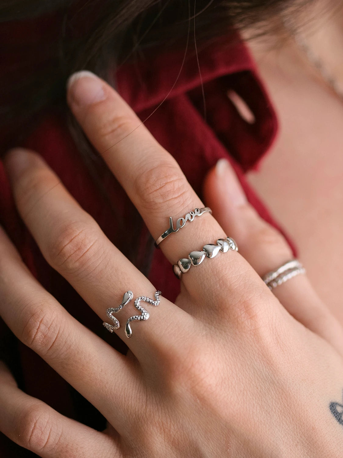 Love symbol sale finger rings