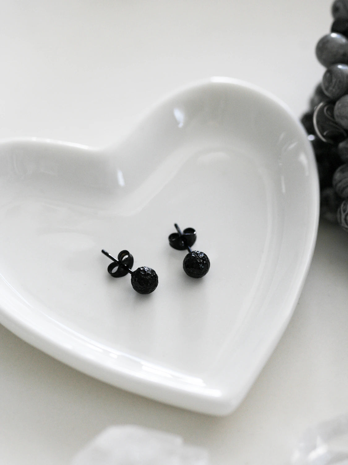 Clous d'oreilles Baccara noir